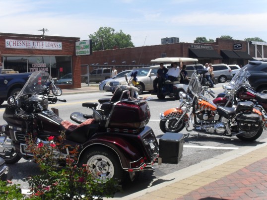 <antique bikes on main 2014>