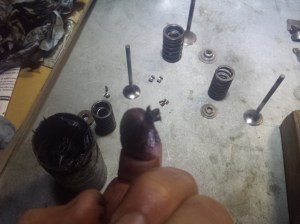 <grease the valve keepers>