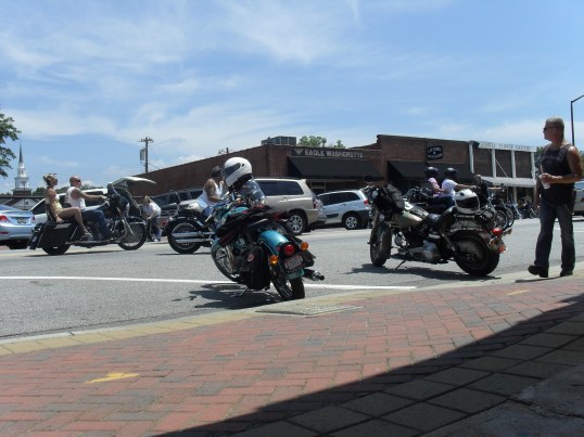 <antique bikes on main 2014>