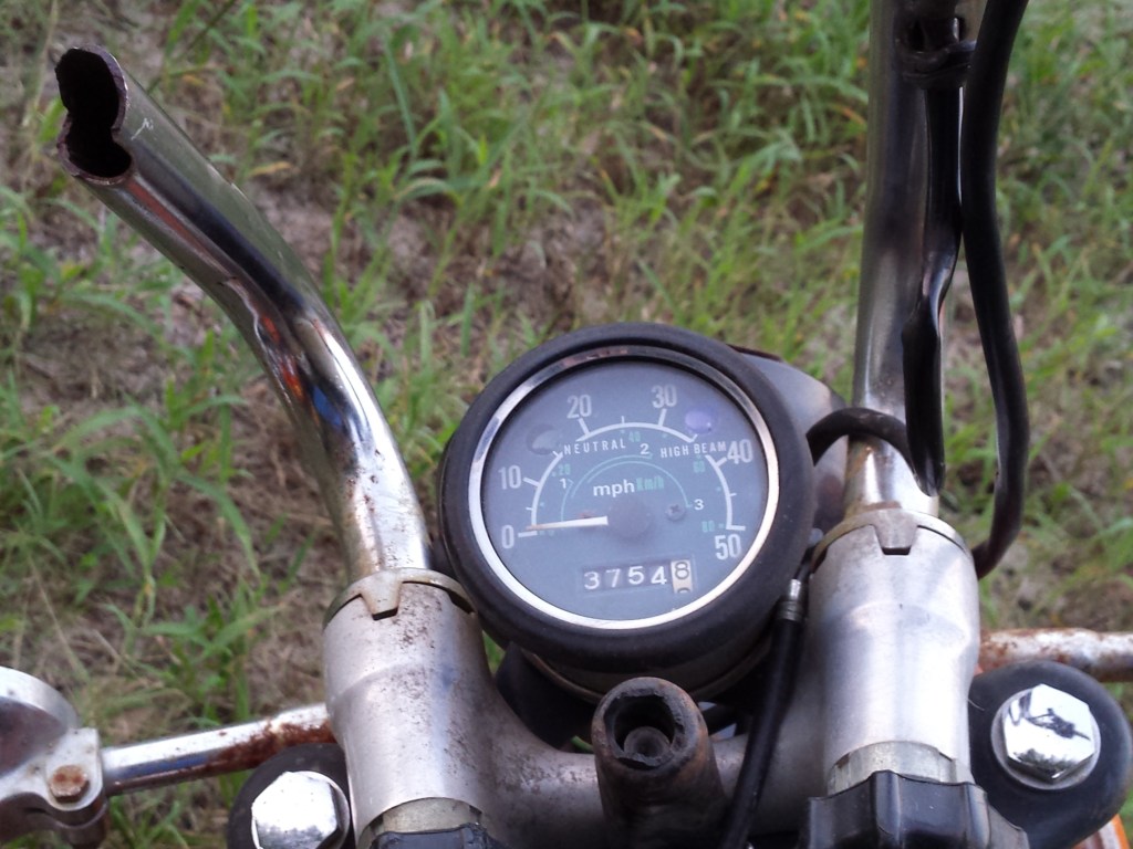 <damaged Honda CT70>