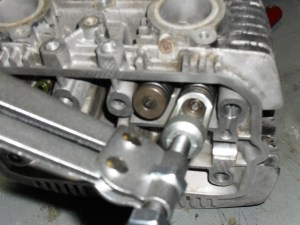 <removing valve keepers>