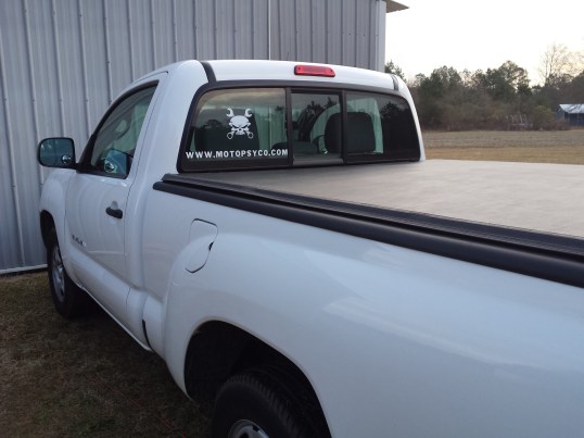 <white Toyota Tacoma Regular cab>